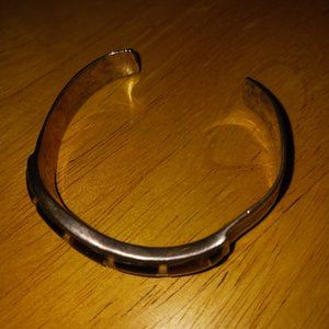 Silver bangle with stones